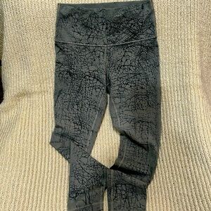 Lululemon leggings- gray with black spiderweb design.